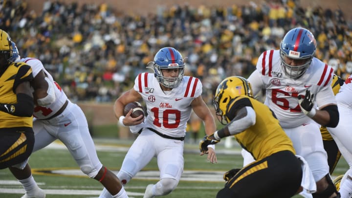 COLUMBIA, MO – OCTOBER 12: Quarterback John Rhys Plumlee #10 of the Mississippi Rebels runs against the Missouri Tigers at Memorial Stadium on October 12, 2019 in Columbia, Missouri. (Photo by Ed Zurga/Getty Images)