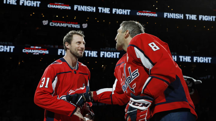 WASHINGTON, DC – OCTOBER 18: MLB player Max Scherzer of the Washington Nationals talks with Alex Ovechkin #8 of the Washington Capitals after taking part in a ceremonial puck drop before a game between the New York Rangers and Capitals at Capital One Arena on October 18, 2019 in Washington, DC. (Photo by Patrick McDermott/NHLI via Getty Images)