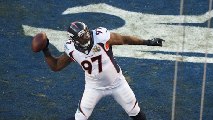 Feb 7, 2016; Santa Clara, CA, USA; Denver Broncos defensive end Malik Jackson (97) throws the ball into the stands after recovering a fumble for a touchdown in Super Bowl 50 at Levi
