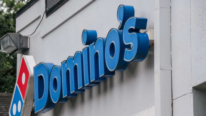 HOUSTON, TEXAS - JULY 22: A Domino's Pizza sign is shown on July 22, 2021 in Houston, Texas. Domino's pizza has reported that its U.S. same-store sales have increased by 3.5% in its latest quarter of production. CEO Ritch Allison has said that the company will raise wages for employees, in certain markets and positions, at corporate-owned restaurants. Allison also noted that a lack of staffing and equipment shortages have been major hurdles as the company continues to deal with problems tied to the pandemic. (Photo by Brandon Bell/Getty Images)