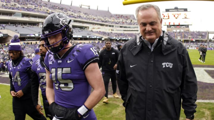 FORT WORTH, TX - NOVEMBER 26: Quarterback Max Duggan #15 of the TCU Horned Frogs and his head coach Sonny Dykes walk on the field before taking on the Iowa State Cyclones at Amon G. Carter Stadium on November 26, 2022 in Fort Worth, Texas. (Photo by Ron Jenkins/Getty Images)