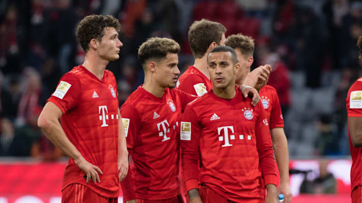 09 February 2020, Bavaria, Munich: Football: Bundesliga, Bayern Munich - RB Leipzig, 21st matchday in the Allianz Arena. Benjamin Pavard (l-r), Philippe Coutinho and Thiago from FC Bayern Munich thank the fans after the game. Photo: Matthias Balk/dpa - IMPORTANT NOTE: In accordance with the regulations of the DFL Deutsche Fußball Liga and the DFB Deutscher Fußball-Bund, it is prohibited to exploit or have exploited in the stadium and/or from the game taken photographs in the form of sequence images and/or video-like photo series. (Photo by Matthias Balk/picture alliance via Getty Images)