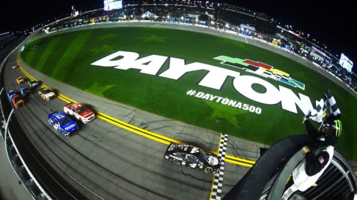 DAYTONA BEACH, FL - FEBRUARY 14: Kevin Harvick, driver of the #4 Busch Beer Car2Can Ford, crosses the finish line to win the Monster Energy NASCAR Cup Series Gander RV Duel At DAYTONA #1 at Daytona International Speedway on February 14, 2019 in Daytona Beach, Florida. (Photo by Jared C. Tilton/Getty Images)