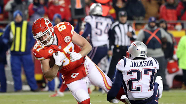 KANSAS CITY, MISSOURI - JANUARY 20: Travis Kelce #87 of the Kansas City Chiefs catches a 12 yard touchdown pass in the third quarter against J.C. Jackson #27 of the New England Patriots during the AFC Championship Game at Arrowhead Stadium on January 20, 2019 in Kansas City, Missouri. (Photo by Patrick Smith/Getty Images)