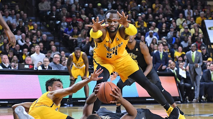 WICHITA, KS – JANUARY 25: Taylor #1 of the UCF Knights tries to pass. (Photo by Peter Aiken/Getty Images)