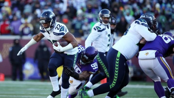 Jan 10, 2016; Minneapolis, MN, USA; Seattle Seahawks running back Fred Jackson (22) is tackled by Minnesota Vikings defensive end Danielle Hunter (99) in the first half of a NFC Wild Card playoff football game at TCF Bank Stadium. Mandatory Credit: Brace Hemmelgarn-USA TODAY Sports