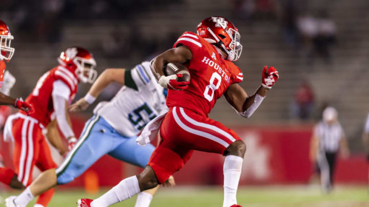 Oct 8, 2020; Houston, Texas, USA; Houston Cougars cornerback Marcus Jones (8) runs the kickoff return during the second quarter at TDECU Stadium. Mandatory Credit: Maria Lysaker-USA TODAY Sports