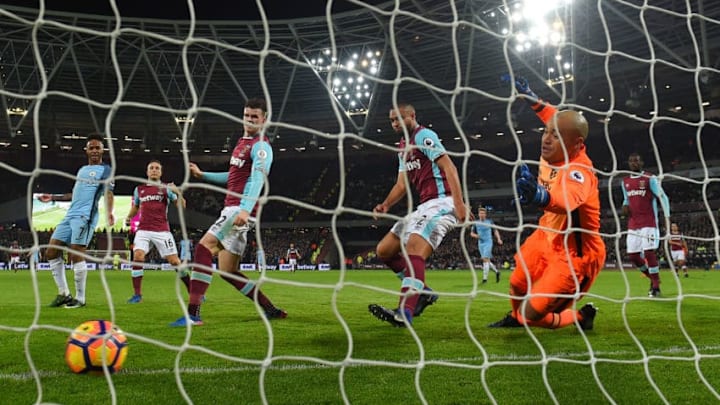 STRATFORD, ENGLAND - FEBRUARY 01: David Silva of Manchester City (not pictured) scores past Darren Randolph of West Ham United for his team's second goal during the Premier League match between West Ham United and Manchester City at London Stadium on February 1, 2017 in Stratford, England. (Photo by Mike Hewitt/Getty Images)
