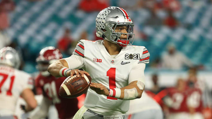 MIAMI GARDENS, FLORIDA – JANUARY 11: Justin Fields #1 of the Ohio State Buckeyes looks to pass during the third quarter of the College Football Playoff National Championship game against the Alabama Crimson Tide at Hard Rock Stadium on January 11, 2021 in Miami Gardens, Florida. (Photo by Mike Ehrmann/Getty Images)