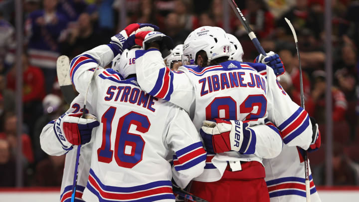 CHICAGO, ILLINOIS – DECEMBER 07: Members of the New York Rangers including Ryan Strome #16 and Mika Zibanejad #93 celebrate a goal by teammate Chris Kreider in the third period against the Chicago Blackhawks at the United Center on December 07, 2021 in Chicago, Illinois. The Rangers defeated the Blackhawks 6-2. (Photo by Jonathan Daniel/Getty Images)