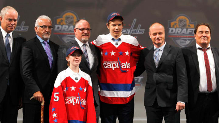 SUNRISE, FL - JUNE 26: Ilya Samsonov poses with members of the Washington Capitals for a group photo after being selected 22nd overall by the Washington Capitals during Round One of the 2015 NHL Draft at BB&T Center on June 26, 2015 in Sunrise, Florida. (Photo by Eliot J. Schechter/NHLI via Getty Images)