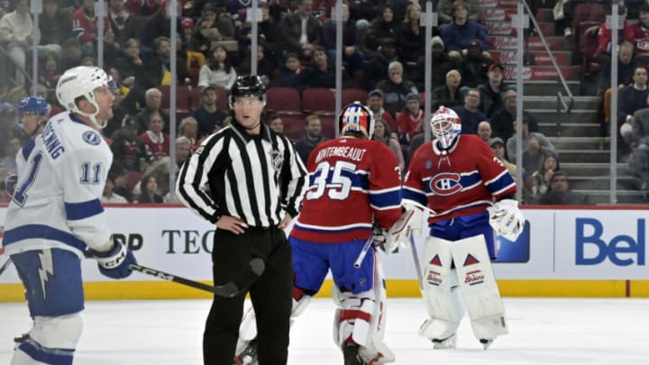 Nov 7, 2023; Montreal, Quebec, CAN; Montreal Canadiens goalie Sam Montembeault (35) replaces teammate goalie Jake Allen (34) during the first period of the game against the Tampa Bay Lightning at the Bell Centre. Mandatory Credit: Eric Bolte-USA TODAY Sports