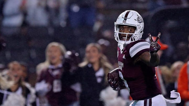 STARKVILLE, MISSISSIPPI - NOVEMBER 05: Rara Thomas #0 of the Mississippi State Bulldogs gestures as he carries the ball during the second half against the Auburn Tigers at Davis Wade Stadium on November 05, 2022 in Starkville, Mississippi. (Photo by Justin Ford/Getty Images)