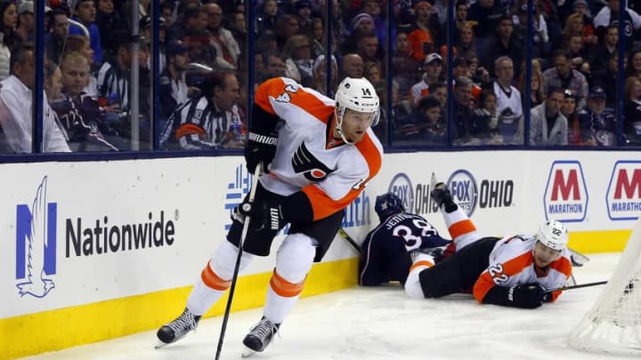 Dec 19, 2015; Columbus, OH, USA; Philadelphia Flyers center Sean Couturier (14) skates with the puck against the Columbus Blue Jackets during the second period at Nationwide Arena. Mandatory Credit: Russell LaBounty-USA TODAY Sports