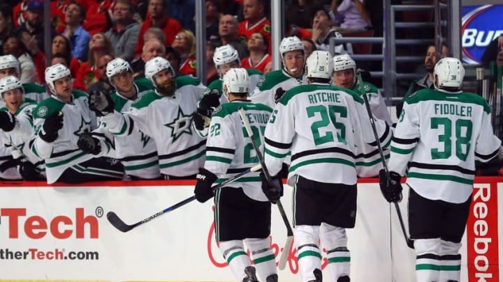 Mar 22, 2016; Chicago, IL, USA; Dallas Stars center Colton Sceviour (22) is congratulated for scoring a goal during the first period against the Chicago Blackhawks at the United Center. Mandatory Credit: Dennis Wierzbicki-USA TODAY Sports