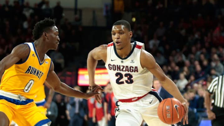 SPOKANE, WA – DECEMBER 31: Zach Norvell Jr. #23 of the Gonzaga Bulldogs drives against Jarkel Joiner #0 of the CSU Bakersfield Roadrunners in the game at McCarthey Athletic Center on December 31, 2018 in Spokane, Washington. Gonzaga defeated CSU Bakersfield 89-54. (Photo by William Mancebo/Getty Images)