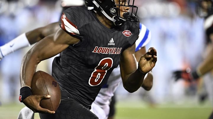 Oct 14, 2016; Louisville, KY, USA; Louisville Cardinals quarterback Lamar Jackson (8) runs the ball against the Duke Blue Devils during the second half at Papa John