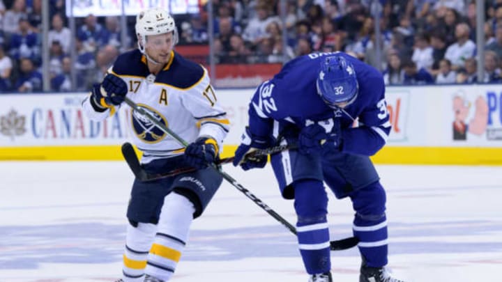 TORONTO, ON – SEPTEMBER 21: Toronto Maple Leafs Left Wing Josh Leivo (32) kicks the puck away from Buffalo Sabres Center Vladimir Sobotka (17) during the NHL preseason game between the Buffalo Sabres and the Toronto Maple Leafs on September 21, 2018, at Scotiabank Arena in Toronto, ON, Canada. (Photograph by Julian Avram/Icon Sportswire via Getty Images)