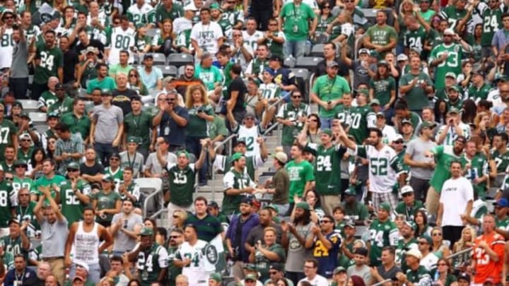 Sep 13, 2015; East Rutherford, NJ, USA; New York Jets fans react to a play during the second half at MetLife Stadium. Mandatory Credit: Danny Wild-USA TODAY Sports