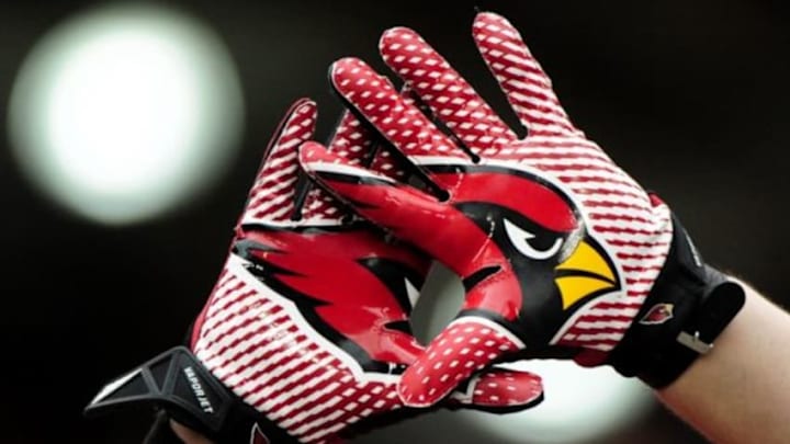 Jul 26, 2014; Tempe, AZ, USA; General view of Arizona Cardinals gloves on a fan during training camp at University of Phoenix. Mandatory Credit: Matt Kartozian-USA TODAY Sports