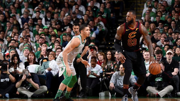 BOSTON, MA - FEBRUARY 11: LeBron James #23 of the Cleveland Cavaliers handles the ball during the game against Jayson Tatum #0 of the Boston Celtics during the game between the two teams on February 11, 2018 at the TD Garden in Boston, Massachusetts. NOTE TO USER: User expressly acknowledges and agrees that, by downloading and or using this photograph, User is consenting to the terms and conditions of the Getty Images License Agreement. Mandatory Copyright Notice: Copyright 2018 NBAE (Photo by Brian Babineau/NBAE via Getty Images)