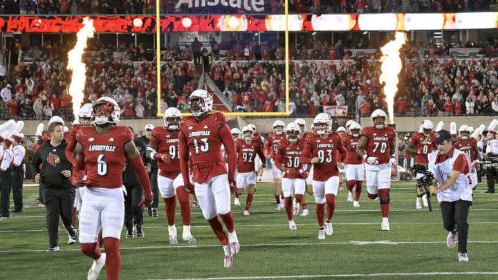 Oct 7, 2023; Louisville, Kentucky, USA; The Louisville Cardinals take the field before facing off against the Notre Dame Fighting Irish at L&N Federal Credit Union Stadium. Louisville defeated Notre Dame 33-20. Mandatory Credit: Jamie Rhodes-USA TODAY Sports