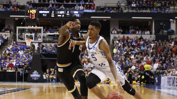 Mar 19, 2017; Indianapolis, IN, USA; Kentucky Wildcats guard Malik Monk (5) drives against Wichita State Shockers forward Zach Brown (1) during the second half in the second round of the 2017 NCAA Tournament at Bankers Life Fieldhouse. Mandatory Credit: Brian Spurlock-USA TODAY Sports
