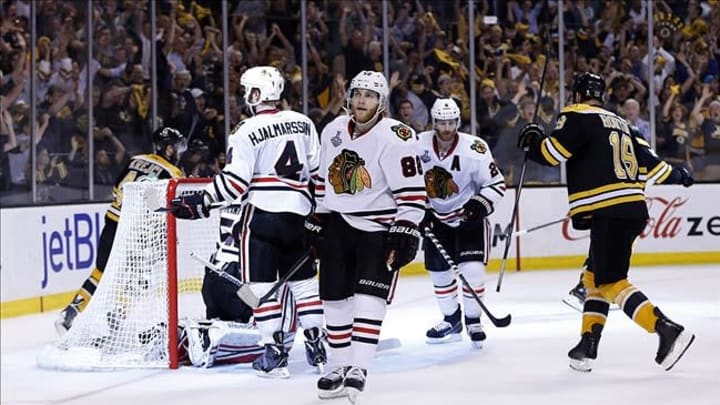 Jun 24, 2013; Boston, MA, USA; Chicago Blackhawks right wing Patrick Kane (88) reacts after a goal is scored by Boston Bruins left wing Milan Lucic (not pictured) during the third period in game six of the 2013 Stanley Cup Final at TD Garden. Mandatory Credit: Greg M. Cooper-USA TODAY Sports