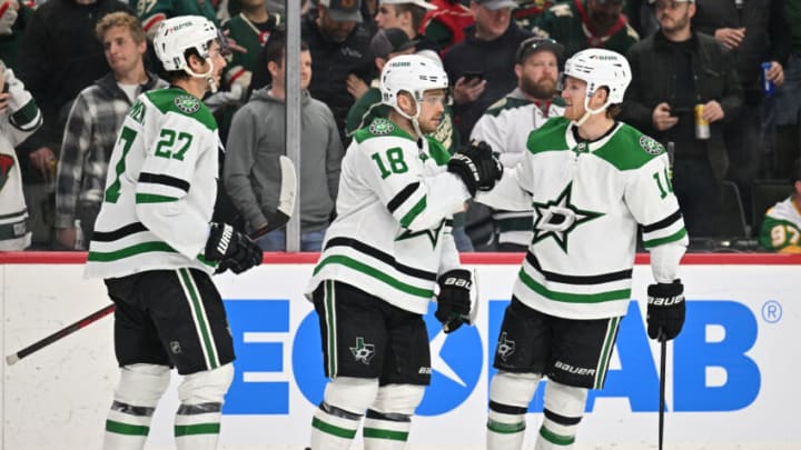 Apr 28, 2023; Saint Paul, Minnesota, USA; Dallas Stars left wing Mason Marchment (27) and center Max Domi (18) and center Ty Dellandrea (10) react after a late goal against the Minnesota Wild during the third period in game six of the first round of the 2023 Stanley Cup Playoffs at Xcel Energy Center. Mandatory Credit: Jeffrey Becker-USA TODAY Sports