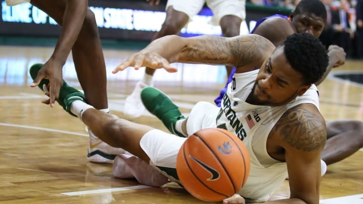 EAST LANSING, MI – DECEMBER 18: Nick Ward #44 of the Michigan State Spartans dives for a loose ball in the second half while playing the Houston Baptist Huskies at the Jack T. Breslin Student Events Center on December 18, 2017 in East Lansing, Michigan. Michigan State won the game 107-62. (Photo by Gregory Shamus/Getty Images)