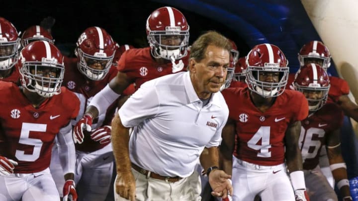 ORLANDO, FL - SEPTEMBER 1: Head Coach Nick Saban of the Alabama Crimson Tide leads his team to the field before the start of the game against the Louisville Cardinals during the Camping World Kickoff at Camping World Stadium on September 1, 2018 in Orlando, Florida. #1 ranked Alabama defeated Louisville 51 to 14. (Photo by Don Juan Moore/Getty Images)
