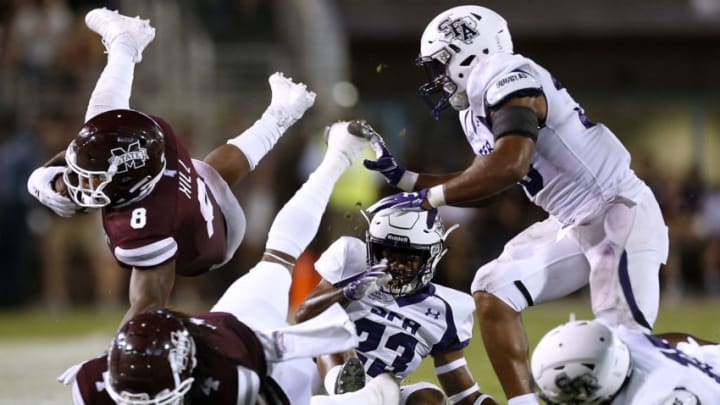 STARKVILLE, MS - SEPTEMBER 01: Kylin Hill #8 of the Mississippi State Bulldogs is pussed out of bounds during the first half against the Stephen F. Austin Lumberjacks at Davis Wade Stadium on September 1, 2018 in Starkville, Mississippi. (Photo by Jonathan Bachman/Getty Images)