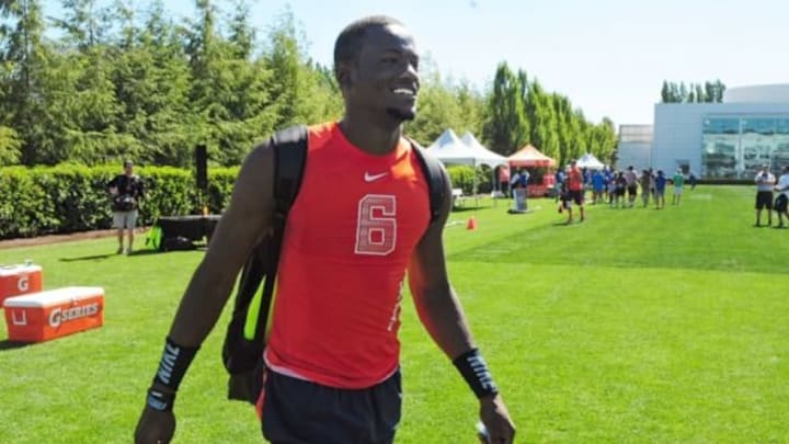 Jul 9, 2014; Beaverton, OR, USA; Alpha Pro athlete Torrance Gibson (6) walks off the field during Nike Football