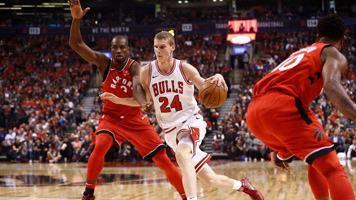 TORONTO, CANADA – OCTOBER 19: Lauri Markkanen #24 of the Chicago Bulls handles the ball during the game against the Toronto Raptors on October 19, 2017 at the Air Canada Centre in Toronto, Ontario, Canada. NOTE TO USER: User expressly acknowledges and agrees that, by downloading and or using this Photograph, user is consenting to the terms and conditions of the Getty Images License Agreement. Mandatory Copyright Notice: Copyright 2017 NBAE (Photo by Mark Blinch/NBAE via Getty Images)