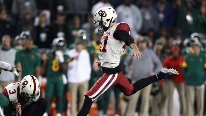 WACO, TEXAS – NOVEMBER 16: Gabe Brkic #47 of the Oklahoma Sooners kicks a field goal against the Baylor Bears in the fourth quarter at McLane Stadium on November 16, 2019 in Waco, Texas. (Photo by Ronald Martinez/Getty Images)