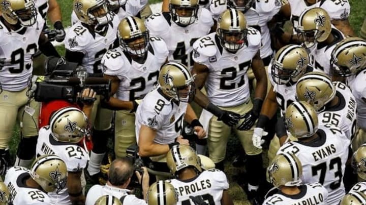 September 23, 2012; New Orleans, LA, USA; New Orleans Saints quarterback Drew Brees (9) huddles with the team prior to kickoff of a game against the Kansas City Chiefs at the Mercedes-Benz Superdome. Mandatory Credit: Derick E. Hingle-USA TODAY Sports