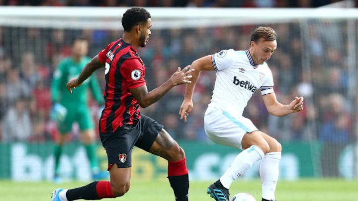 BOURNEMOUTH, ENGLAND - SEPTEMBER 28: Mark Noble of West Ham United battles for possession with Joshua King of AFC Bournemouthduring the Premier League match between AFC Bournemouth and West Ham United at Vitality Stadium on September 28, 2019 in Bournemouth, United Kingdom. (Photo by Jordan Mansfield/Getty Images)
