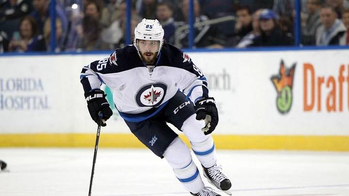 Feb 18, 2016; Tampa, FL, USA; Winnipeg Jets center Mathieu Perreault (85) skates with the puck during the first period at Amalie Arena. Mandatory Credit: Kim Klement-USA TODAY Sports