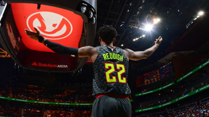 ATLANTA, GA - DECEMBER 13: Cam Reddish #22 of the Atlanta Hawks looks on during the game against the Indiana Pacers on December 13, 2019 at State Farm Arena in Atlanta, Georgia. NOTE TO USER: User expressly acknowledges and agrees that, by downloading and/or using this Photograph, user is consenting to the terms and conditions of the Getty Images License Agreement. Mandatory Copyright Notice: Copyright 2019 NBAE (Photo by Scott Cunningham/NBAE via Getty Images)