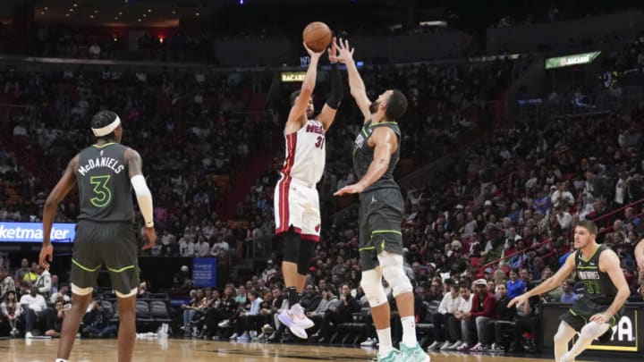 Max Strus #31 of the Miami Heat attempts a shot while being defended by Rudy Gobert #27 of the Minnesota Timberwolves(Photo by Eric Espada/Getty Images)