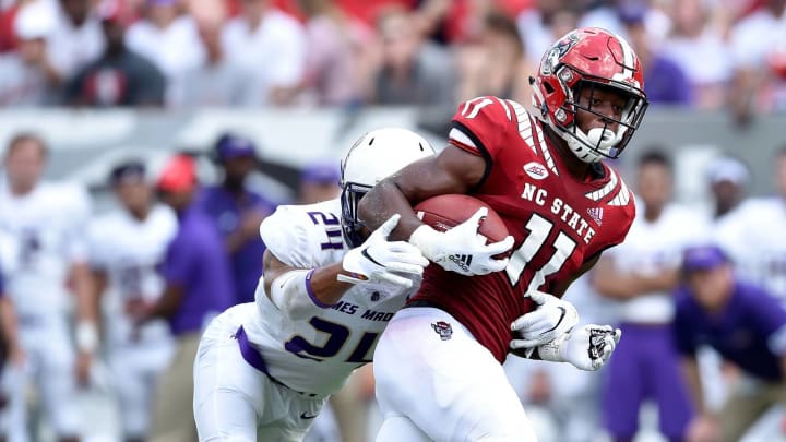 RALEIGH, NC – SEPTEMBER 01: Jakobi Meyers #11 of the North Carolina State Wolfpack makes a catch as D’Angelo Amos #24 of the James Madison Dukes defends during their game at Carter-Finley Stadium on September 1, 2018 in Raleigh, North Carolina. (Photo by Grant Halverson/Getty Images)
