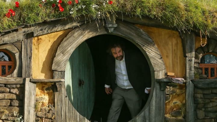 WELLINGTON, NEW ZEALAND - NOVEMBER 28: Director Sir Peter Jackson emerges from from a Hobbit house before delivering a speech at the 'The Hobbit: An Unexpected Journey' World Premiere at Embassy Theatre on November 28, 2012 in Wellington, New Zealand. (Photo by Hagen Hopkins/Getty Images)