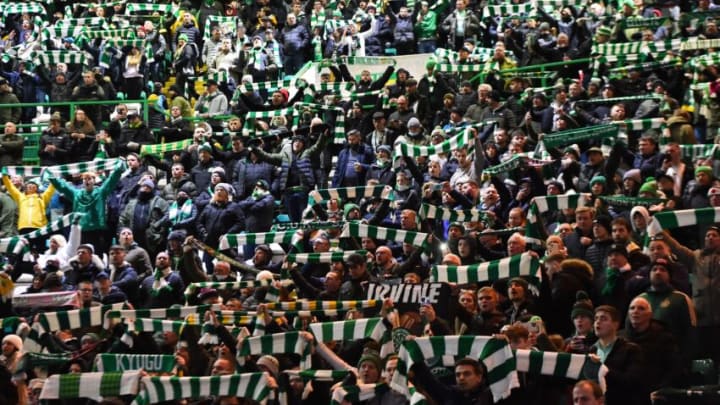 Celtic fans sing ahead of the UEFA Europa League group G football match between Celtic and Real Betis at Celtic Park stadium in Glasgow, Scotland on December 9, 2021. (Photo by ANDY BUCHANAN / AFP) (Photo by ANDY BUCHANAN/AFP via Getty Images)