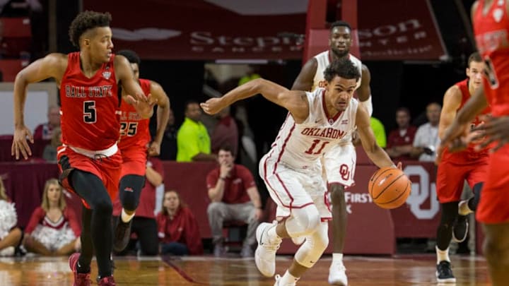 NORMAN, OK - NOVEMBER 15: Trae Young (11) of the Oklahoma Sooners dribbles up court during the Oklahoma Sooners against the Ball State Cardinals at the Lloyd Noble Center in Norman, Ok. (Photo by Richard Rowe/Icon Sportswire via Getty Images)
