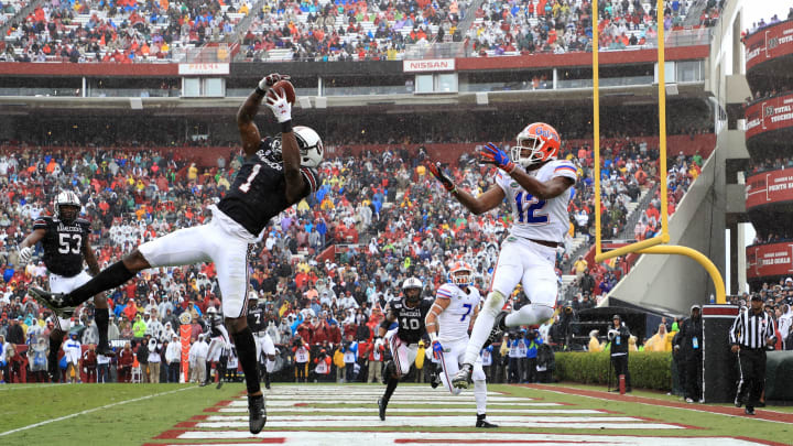 COLUMBIA, SOUTH CAROLINA – OCTOBER 19: Jaycee Horn #1 of the South Carolina Gamecocks goes after a pass against C.J. McWilliams #12 of the Florida Gators during their game at Williams-Brice Stadium on October 19, 2019 in Columbia, South Carolina. (Photo by Streeter Lecka/Getty Images)