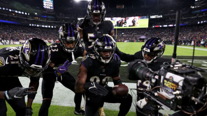 BALTIMORE, MARYLAND - NOVEMBER 28: Odafe Oweh #99 of the Baltimore Ravens celebrates a fumble recovery in the second quarter during a game against the Cleveland Browns at M&T Bank Stadium on November 28, 2021 in Baltimore, Maryland. (Photo by Patrick Smith/Getty Images)