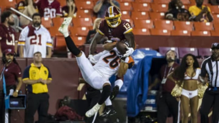 LANDOVER, MD – AUGUST 15: Kelvin Harmon #13 of the Washington Redskins is called for offensive pass interference against Jordan Brown #26 of the Cincinnati Bengals during the second half of a preseason game at FedExField on August 15, 2019 in Landover, Maryland. (Photo by Scott Taetsch/Getty Images)