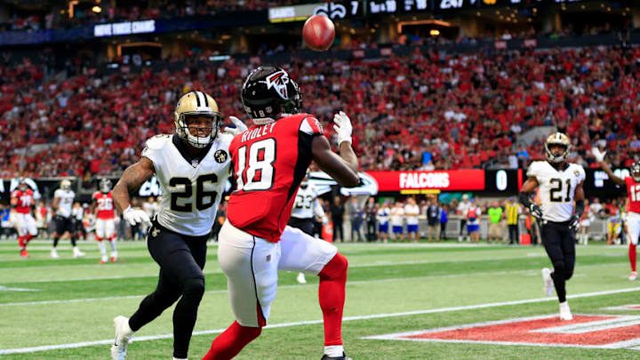 ATLANTA, GA - SEPTEMBER 23: Calvin Ridley #18 of the Atlanta Falcons catches a touchdown pass over P.J. Williams #26 of the New Orleans Saints during the first half at Mercedes-Benz Stadium on September 23, 2018 in Atlanta, Georgia. (Photo by Daniel Shirey/Getty Images)