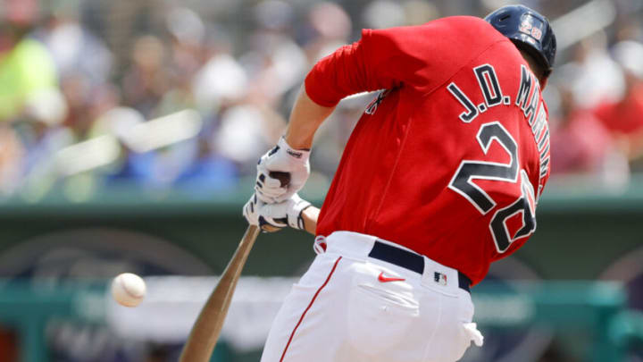 Mar 20, 2022; Fort Myers, Florida, USA; Boston Red Sox designated hitter J.D. Martinez (28) connects for a base hit in the third inning of the game against the Baltimore Orioles during spring training at JetBlue Park at Fenway South. Mandatory Credit: Sam Navarro-USA TODAY Sports