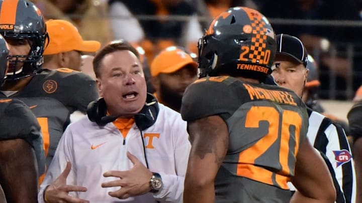 NASHVILLE, TN - DECEMBER 30: Head coach Butch Jones coaches Cortez McDowell